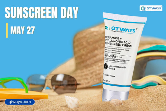Qtways Ceramide + Hyaluronic Acid Sunscreen Cream SPF 50 PA++++ displayed on a beach-themed background with sunglasses, flip-flops, sand, and summer accessories, promoting National Sunscreen Day on May 27.