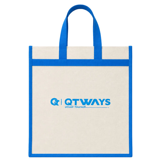 Natural canvas tote bag with bright blue handles and blue edge trim, featuring the QTWAYS logo and the tagline "Unveil Yourself" printed in blue on the front. The bag has a simple, reusable shopping tote design with an open top