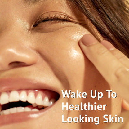 A close-up banner in India featuring a smiling woman touching her healthy, glowing, and radiant cheek, with overlay text reading Wake Up To Healthier Looking Skin, representing the results of QTWAYS Evening Routine Kit.